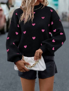 Γυναικείο πουλόβερ  καρδιές K18152 μαύρο/ροζ